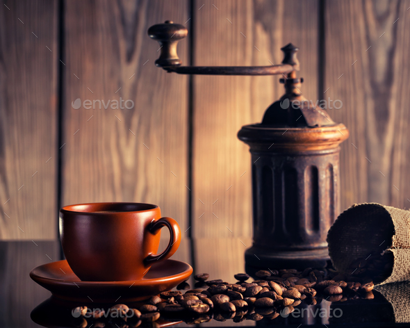 Coffee still life with an old coffee grinder